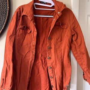 Burnt orange distressed denim jacket